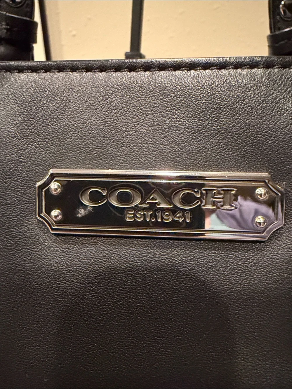 Coach sleek black